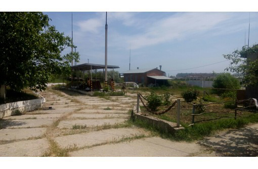 Промышленная площадка с ангаром в Крыму - Продам в Керчи