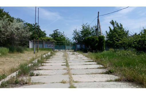 Промышленная площадка с ангаром в Крыму - Продам в Керчи